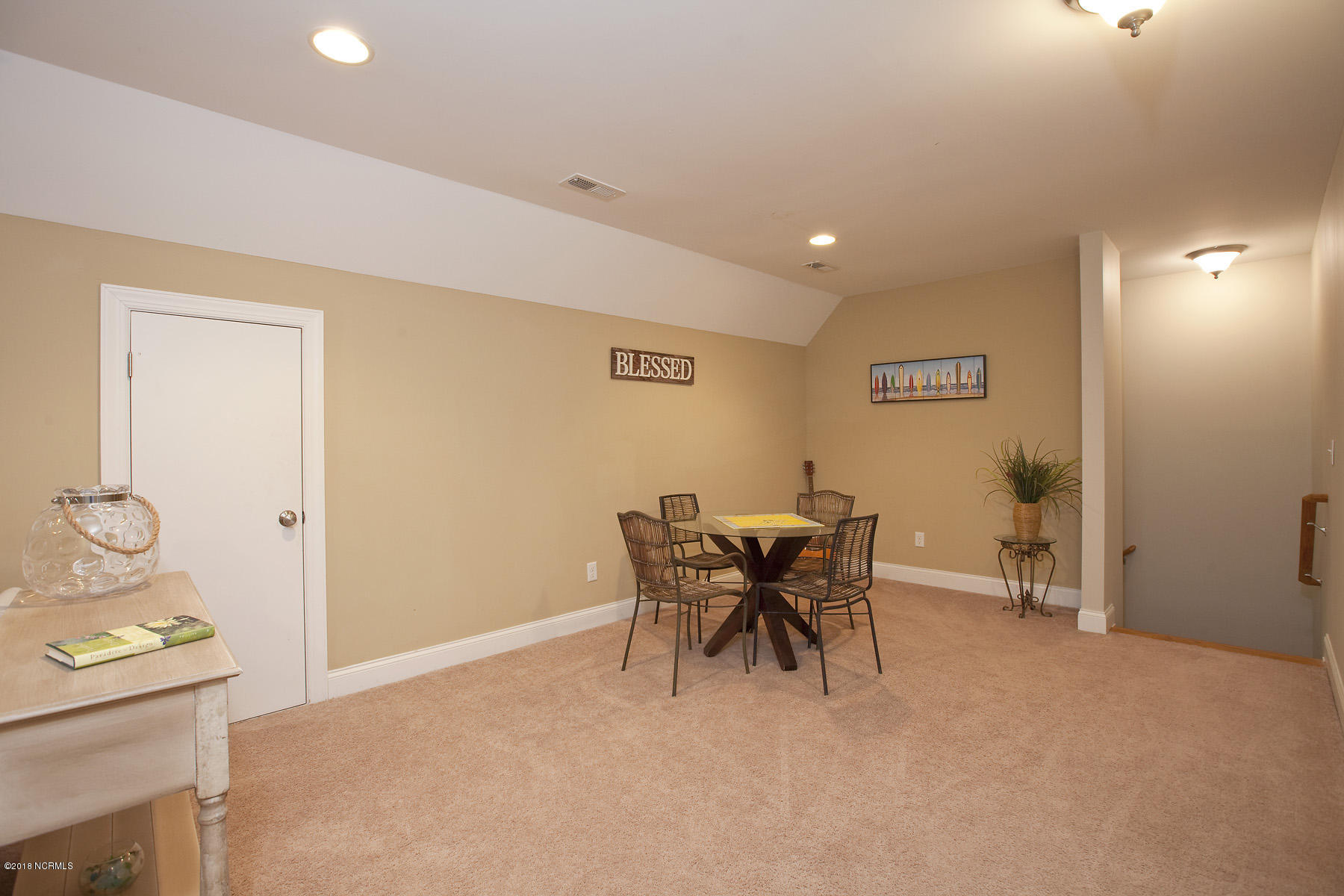 112 Spring Chase Lane Rocky Point, NC 28457 - Photo 30 of 63 Upstairs there is a giant loft that can be closed off to separate the in-law suite from the family side of the house