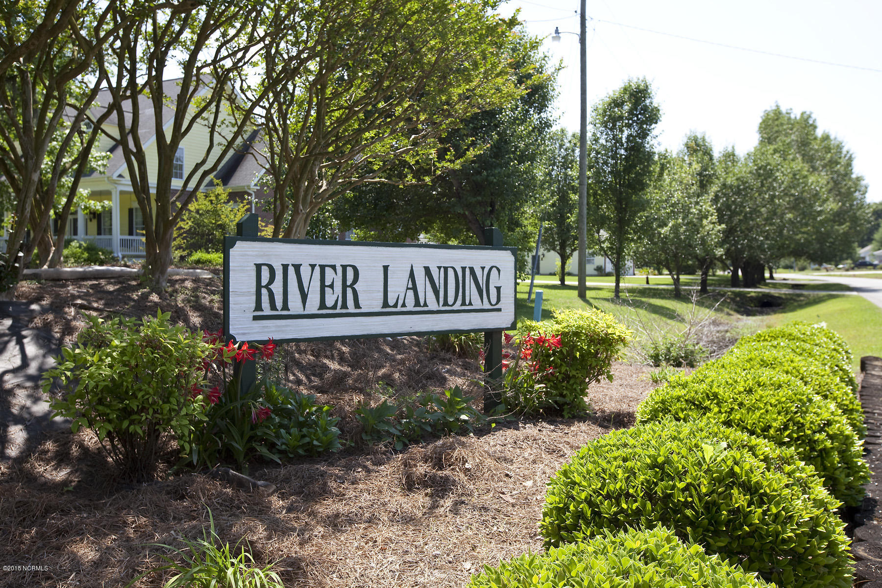 112 Spring Chase Lane Rocky Point, NC 28457 - Photo 4 of 63 River Landing is a well-kept community 20 minutes from Wilmington where the lots are big and the trees are plentiful.