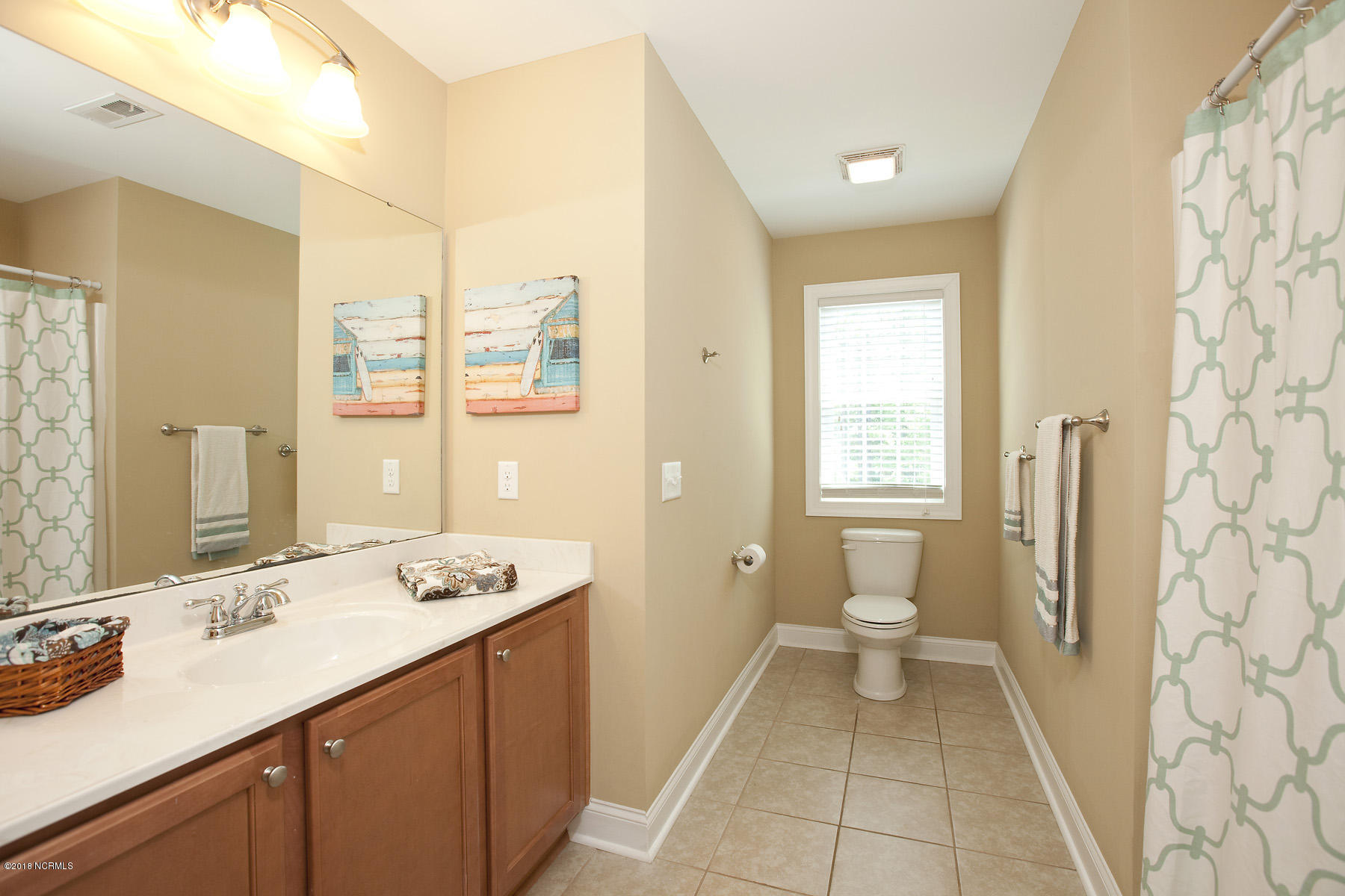 112 Spring Chase Lane Rocky Point, NC 28457 - Photo 39 of 63 Upstairs full bath has tub/shower combo