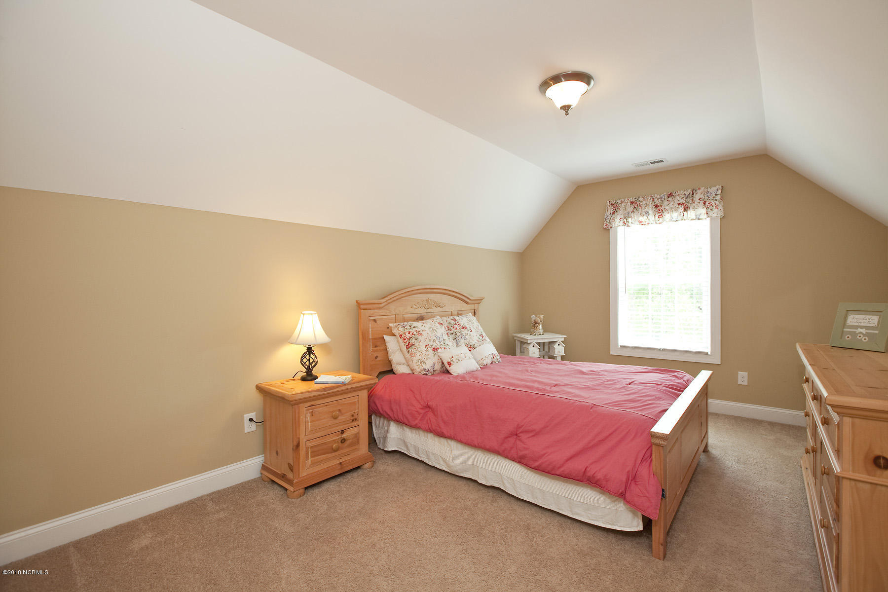 112 Spring Chase Lane Rocky Point, NC 28457 - Photo 41 of 63 Spacious in-law suite bedroom is located upstairs