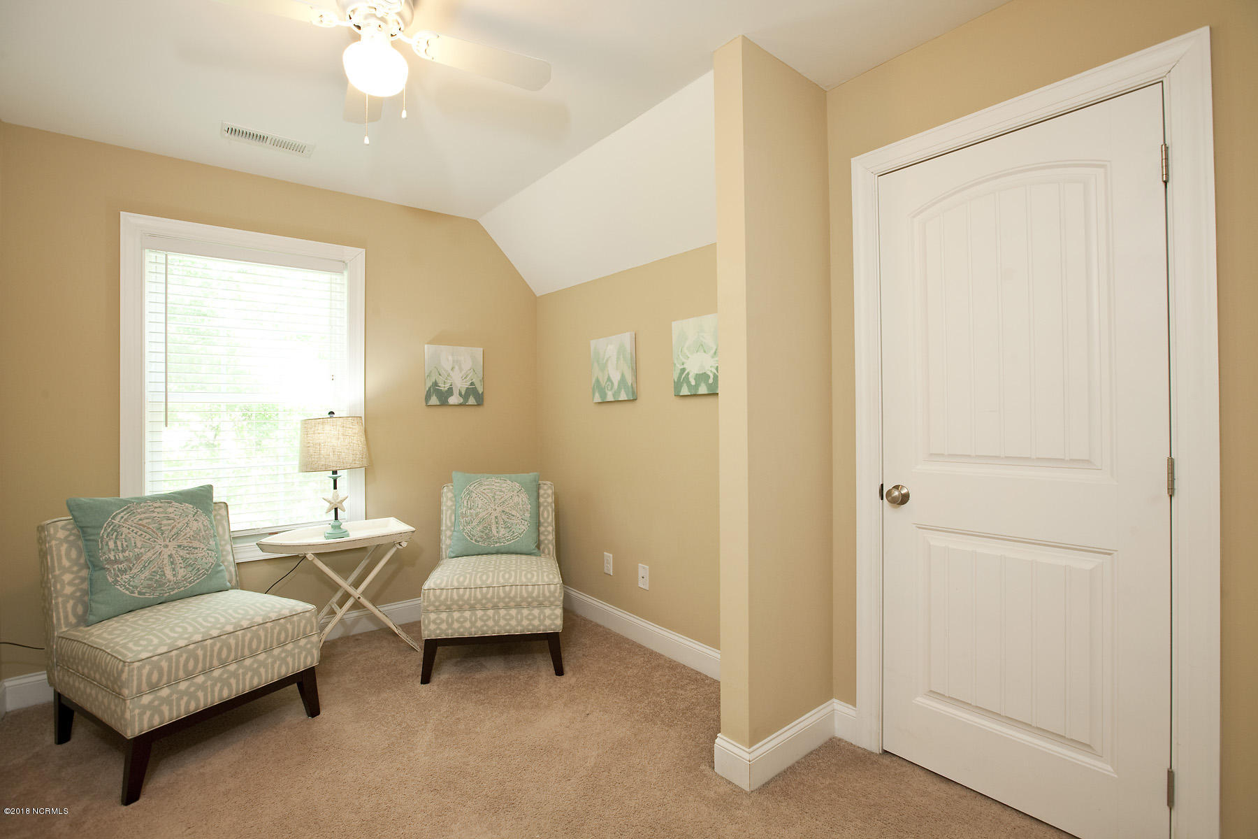 112 Spring Chase Lane Rocky Point, NC 28457 - Photo 43 of 63 In-law suite has sitting room with storage closet