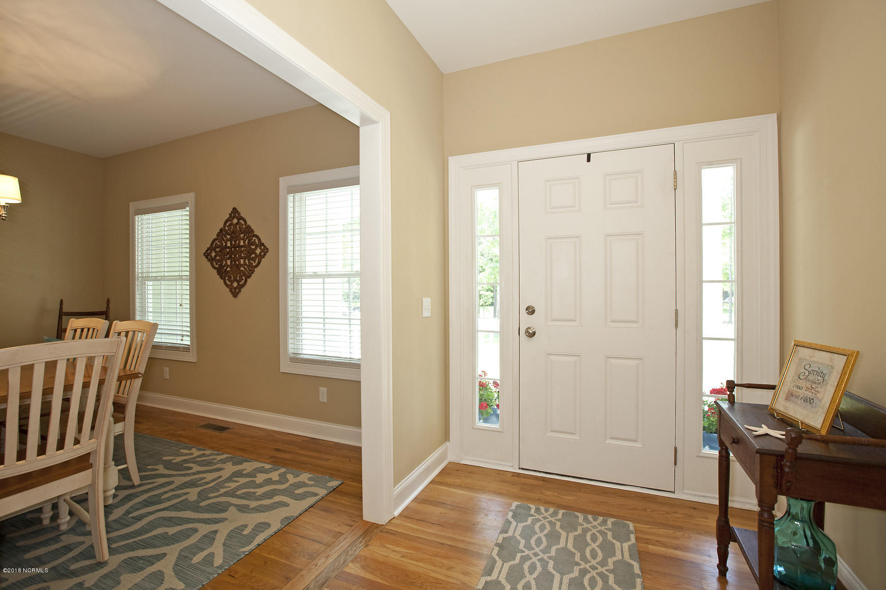 112 Spring Chase Lane Rocky Point, NC 28457 - Photo 9 of 63 Foyer leads to dining room and office downstairs