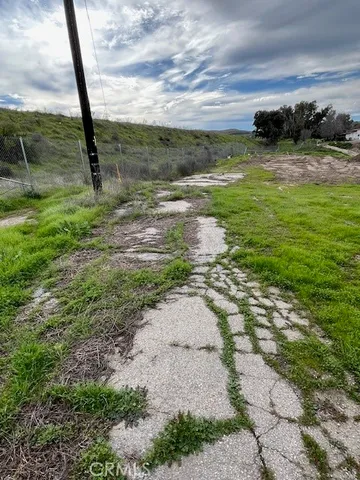 a view of a lake with a yard