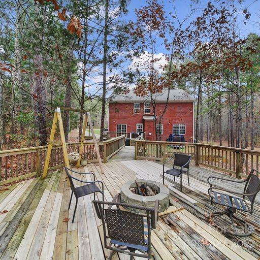 2048 Standing Timber Road Lancaster, SC 29720 - Photo 5 of 39 a view of a patio with couches table and chairs