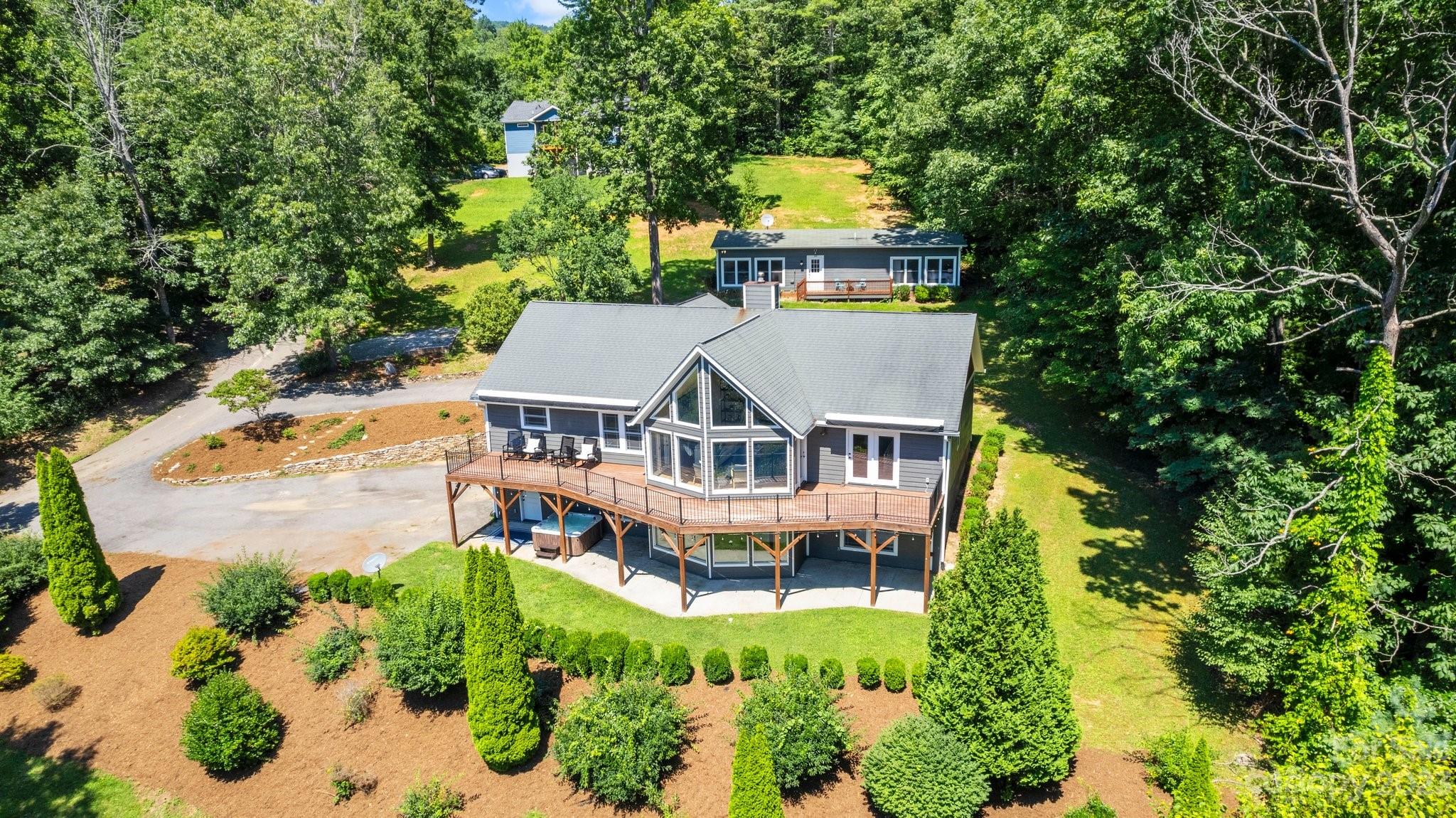 188 White Oak Gap Road Asheville, NC 28803 - Photo 1 of 48 an aerial view of a house with a garden