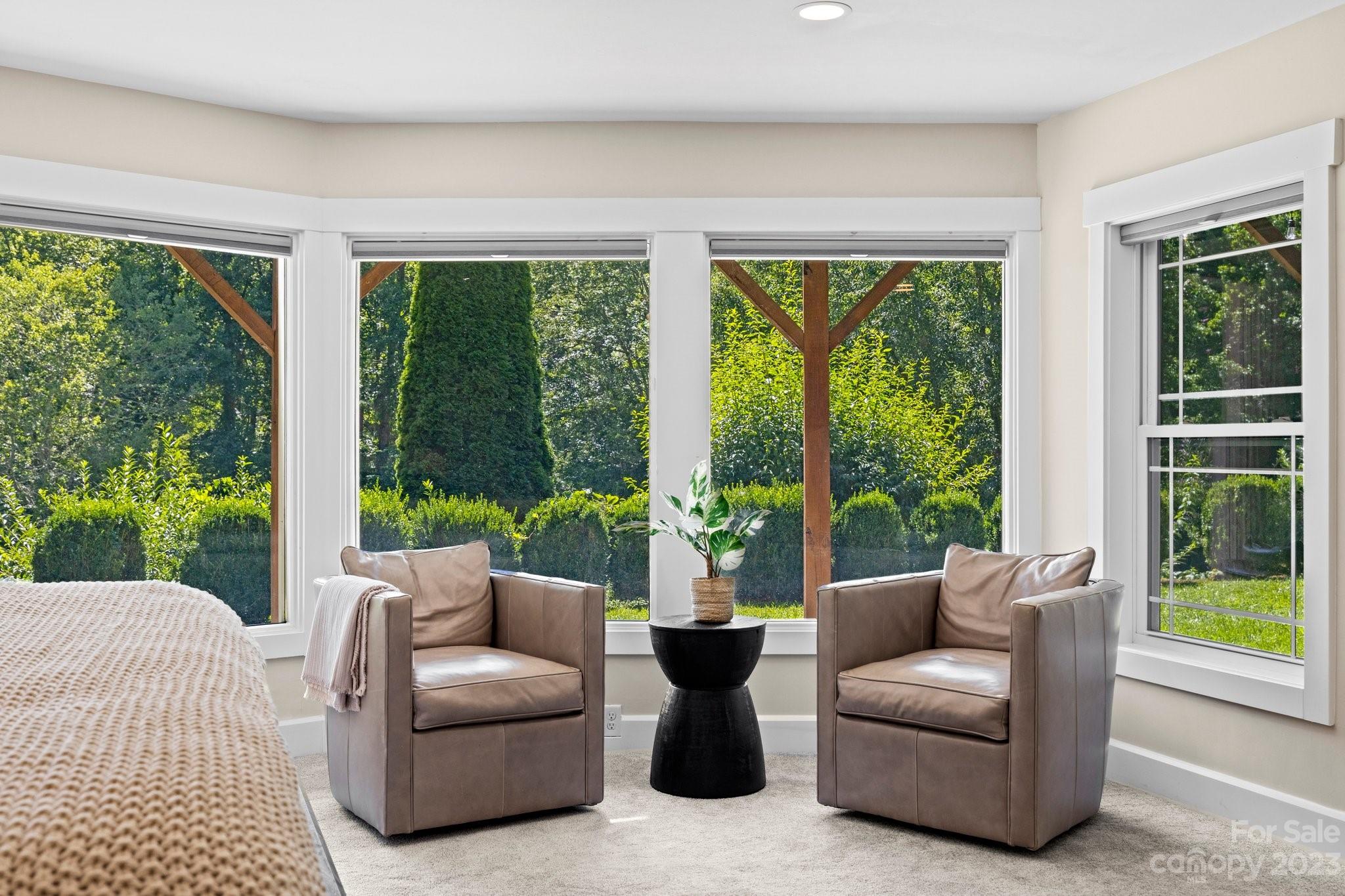 188 White Oak Gap Road Asheville, NC 28803 - Photo 25 of 48 a living room with furniture and windows