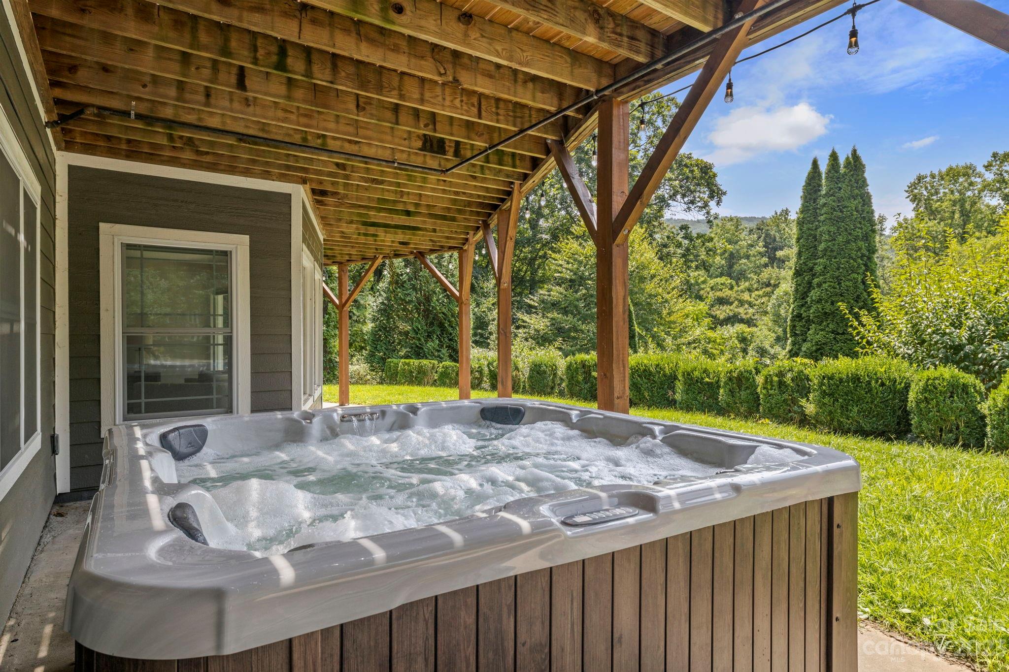 188 White Oak Gap Road Asheville, NC 28803 - Photo 34 of 48 a view of a backyard with a tub
