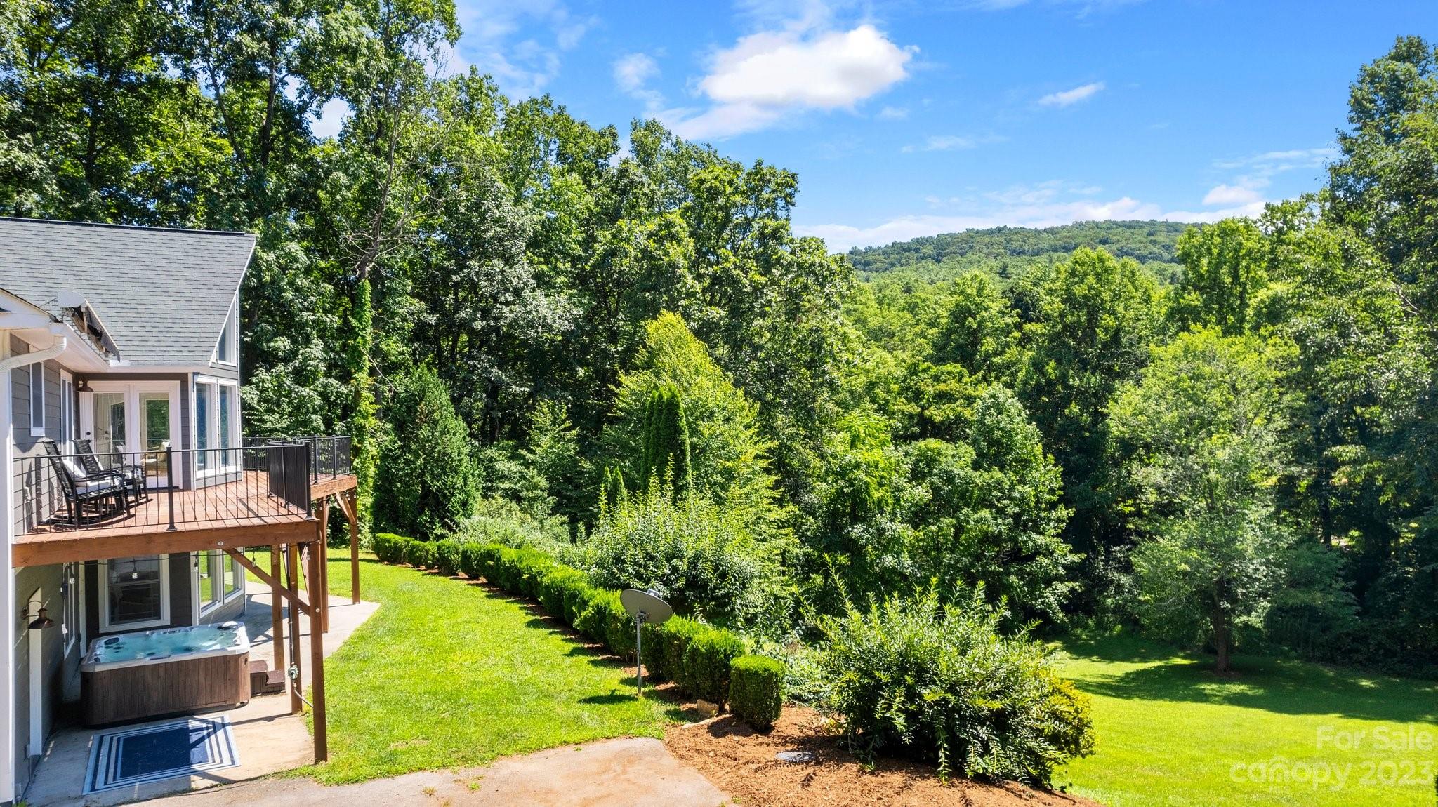 188 White Oak Gap Road Asheville, NC 28803 - Photo 46 of 48 a view of a house with a yard