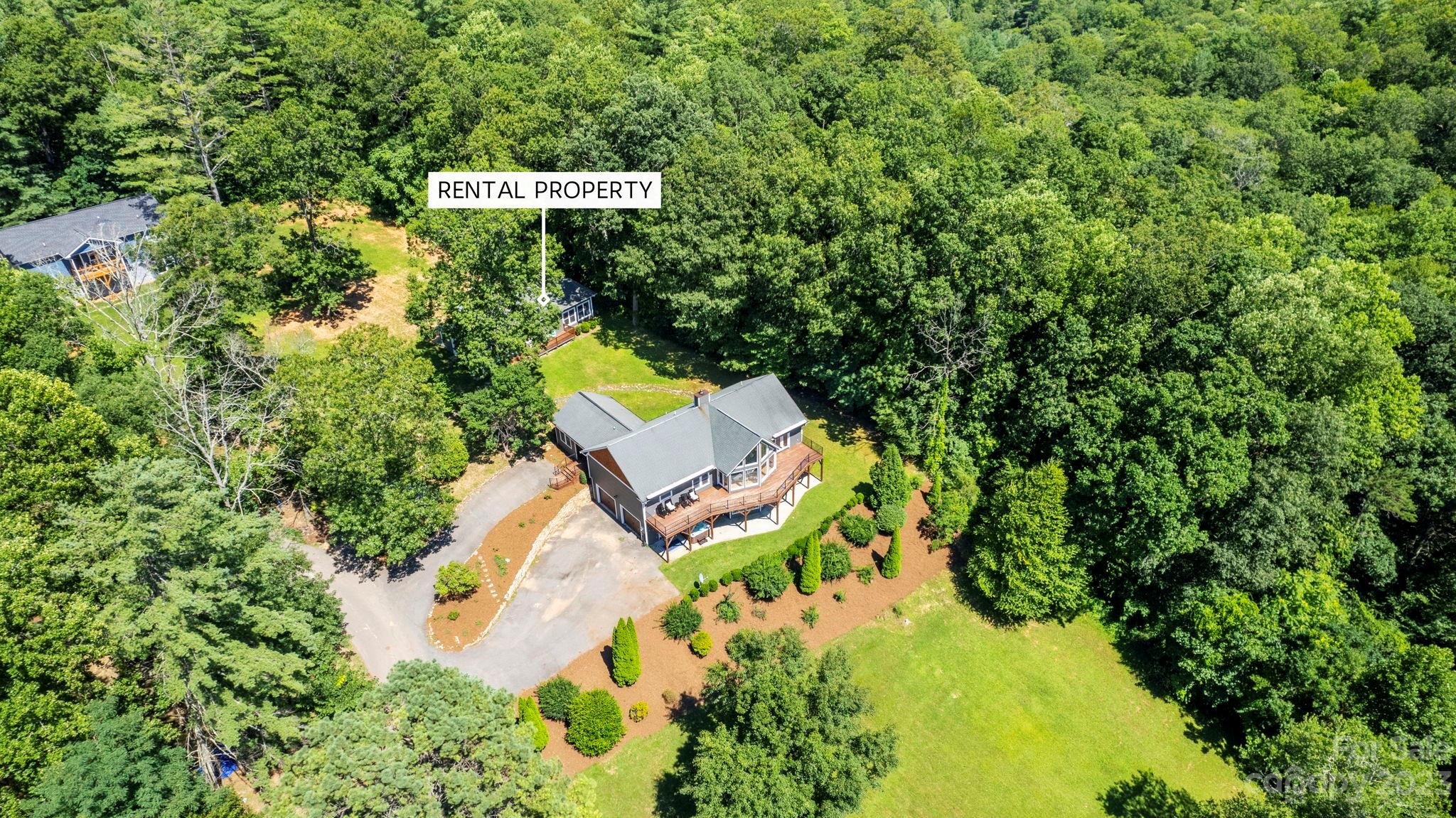 188 White Oak Gap Road Asheville, NC 28803 - Photo 47 of 48 an aerial view of a house with swimming pool and garden