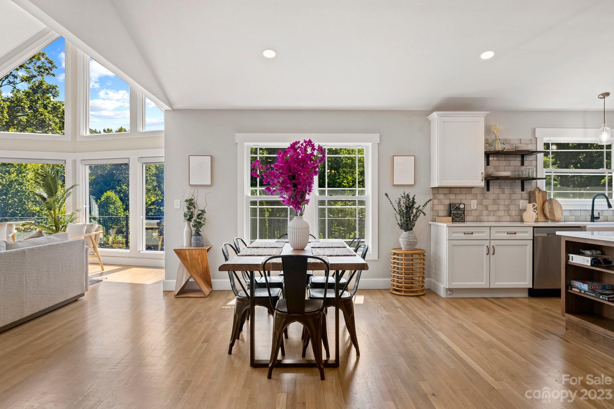 188 White Oak Gap Road Asheville, NC 28803 - Photo 9 of 48 a view of a dining room with furniture and wooden floor