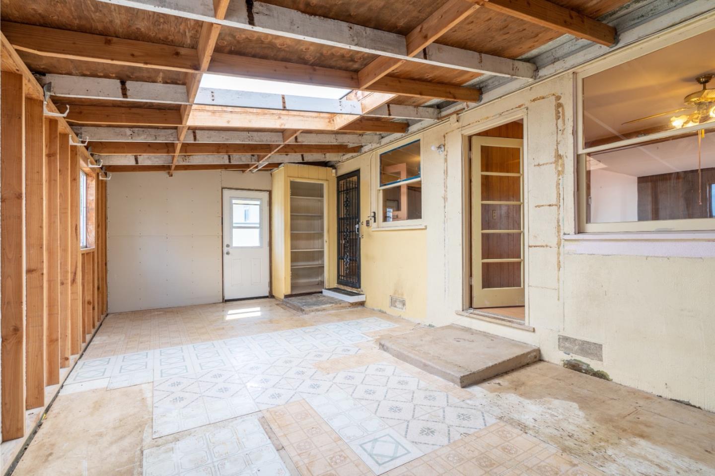 1139 Peralta Road Pacifica, CA 94044 - Photo 11 of 23 an empty room with windows