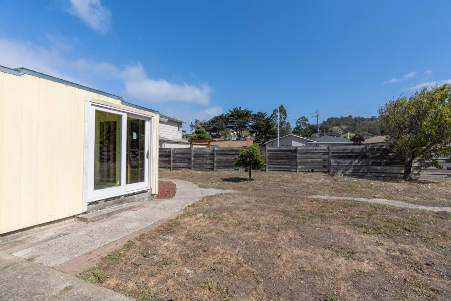 1139 Peralta Road Pacifica, CA 94044 - Photo 19 of 23 a view of a porch with a yard