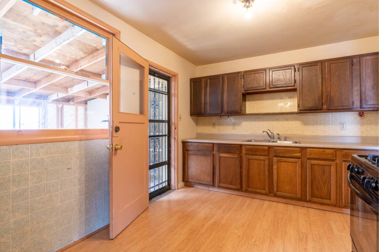 1139 Peralta Road Pacifica, CA 94044 - Photo 4 of 23 a kitchen with stainless steel appliances granite countertop a refrigerator and a sink