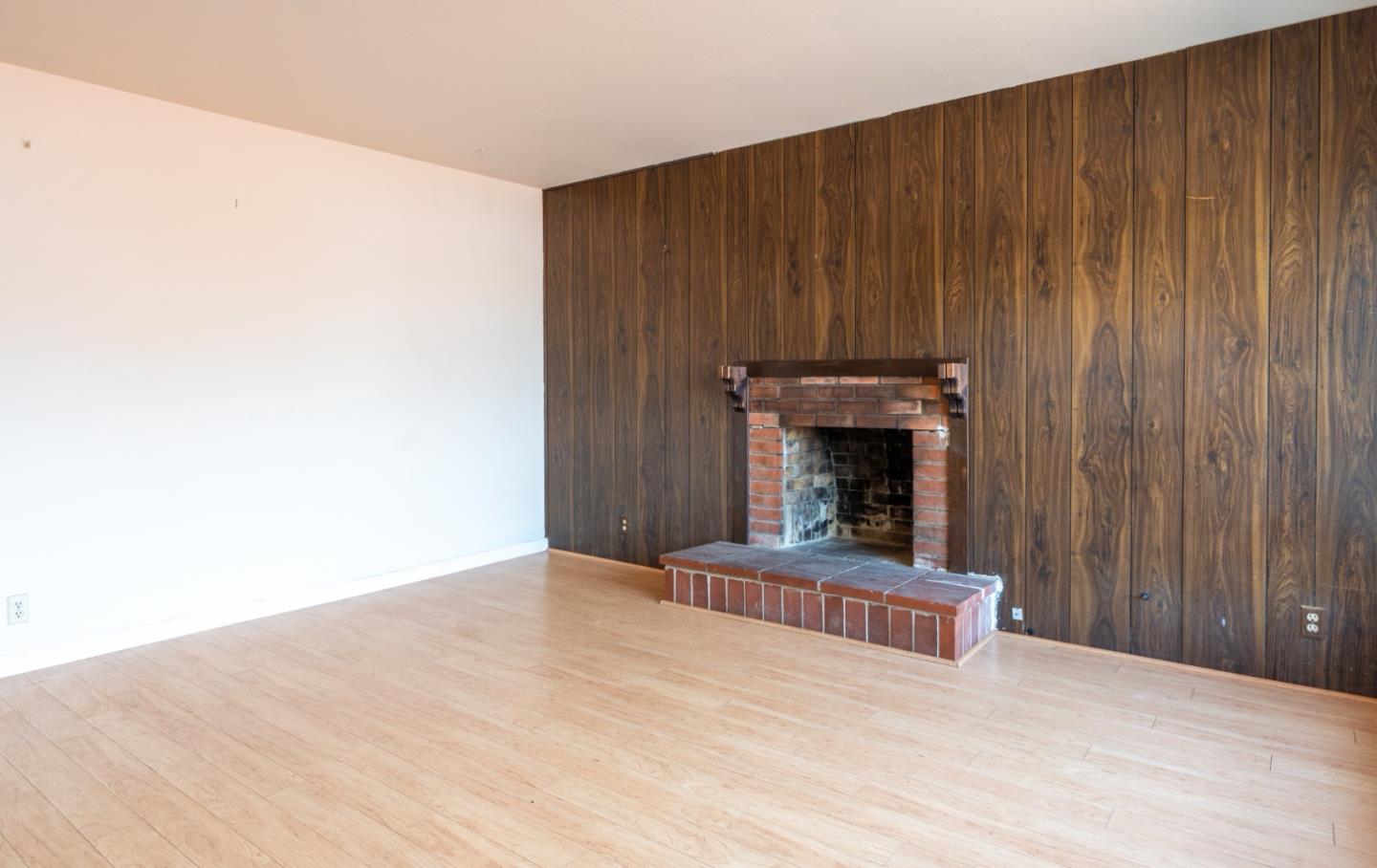 1139 Peralta Road Pacifica, CA 94044 - Photo 10 of 23 a large room with a fireplace in it