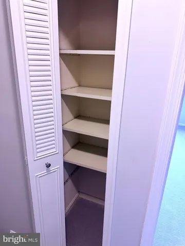 a view of a room with rack on the wall