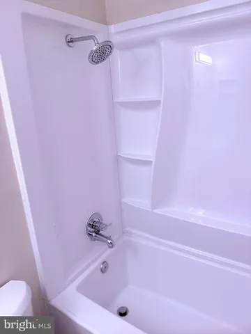 a bathroom with a sink a vanity and a mirror