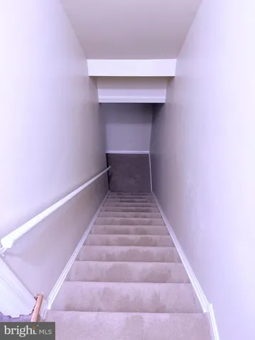 a view of a room with a hallway