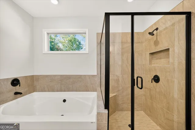 a bathroom with 2 sink and a mirror