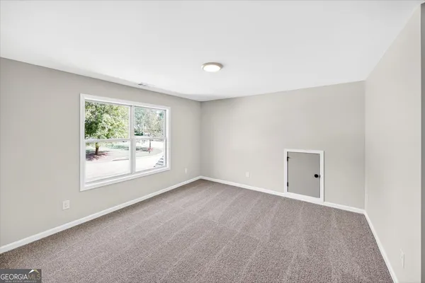 an empty room with windows