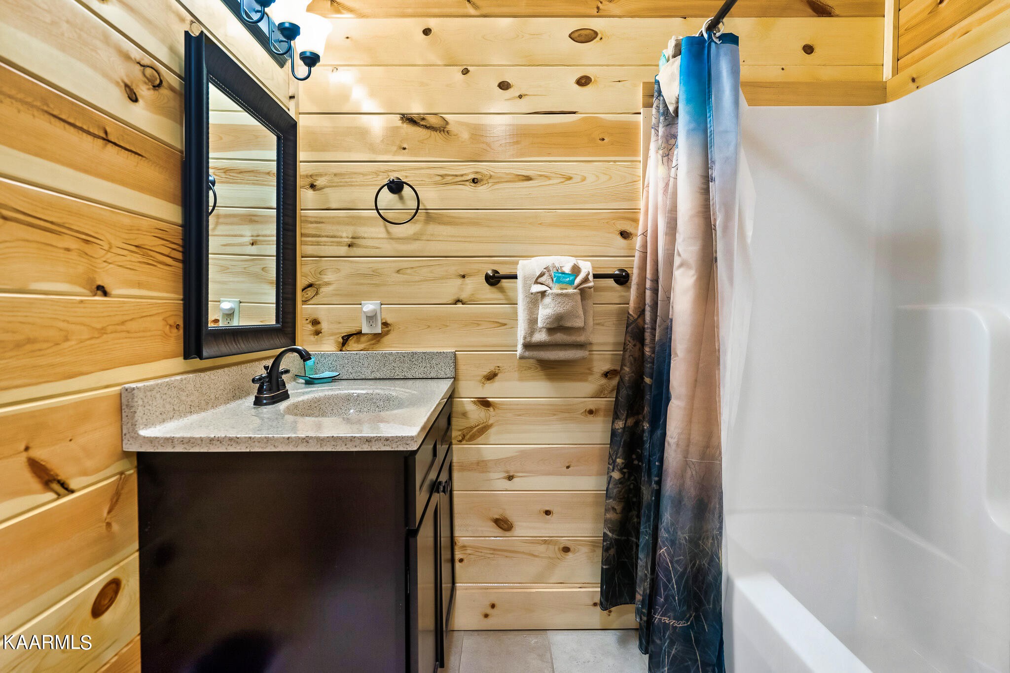 1107 Antelope Way Sevierville, TN 37876 - Photo 13 of 32 a bathroom with a sink and a mirror