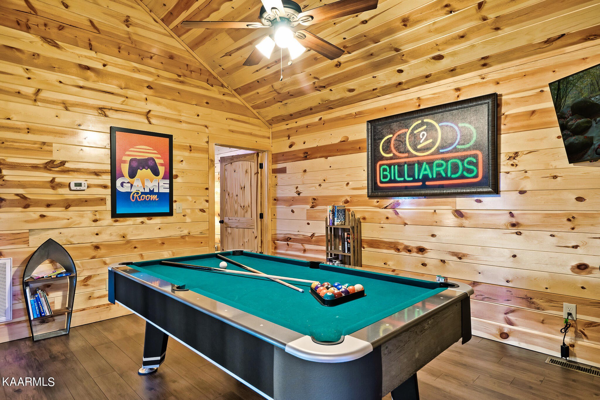 1107 Antelope Way Sevierville, TN 37876 - Photo 8 of 32 a room with pool table and paintings on the wall