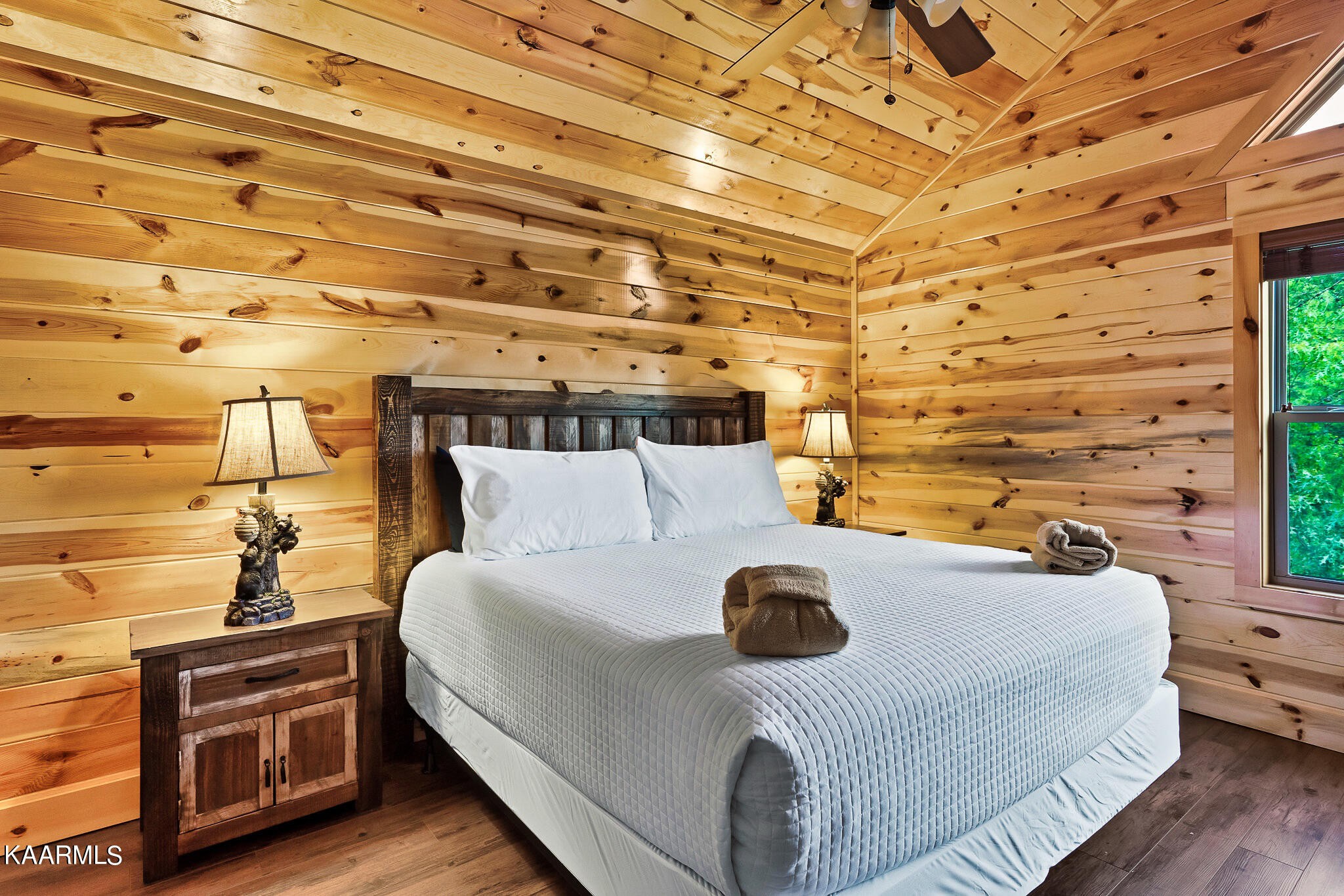 1107 Antelope Way Sevierville, TN 37876 - Photo 10 of 32 a bed room with a bed and a chair