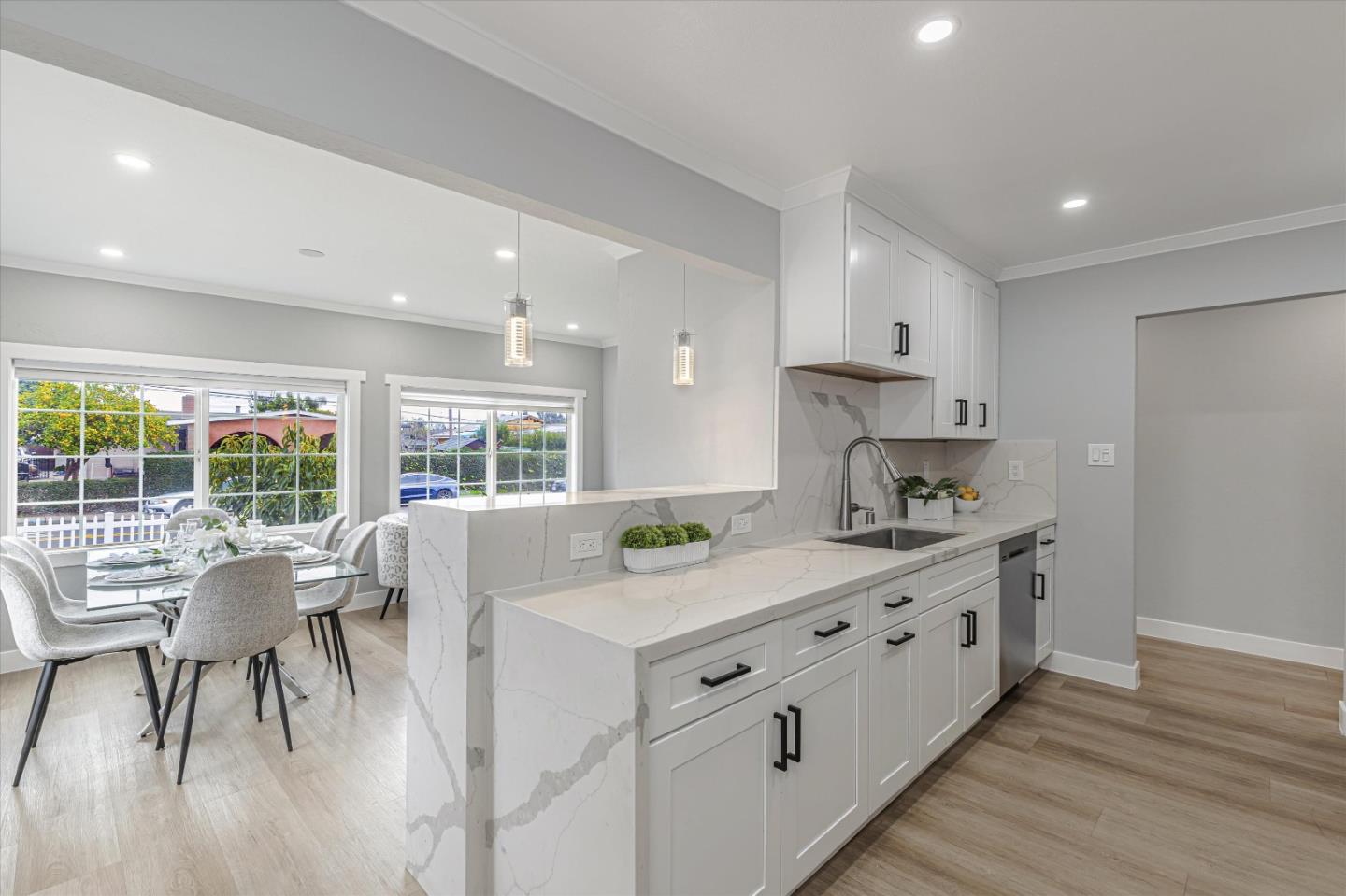 2797 Cornwall Drive San Jose, CA 95127 - Photo 5 of 24 a kitchen with stainless steel appliances granite countertop a stove a sink a refrigerator and wooden floor