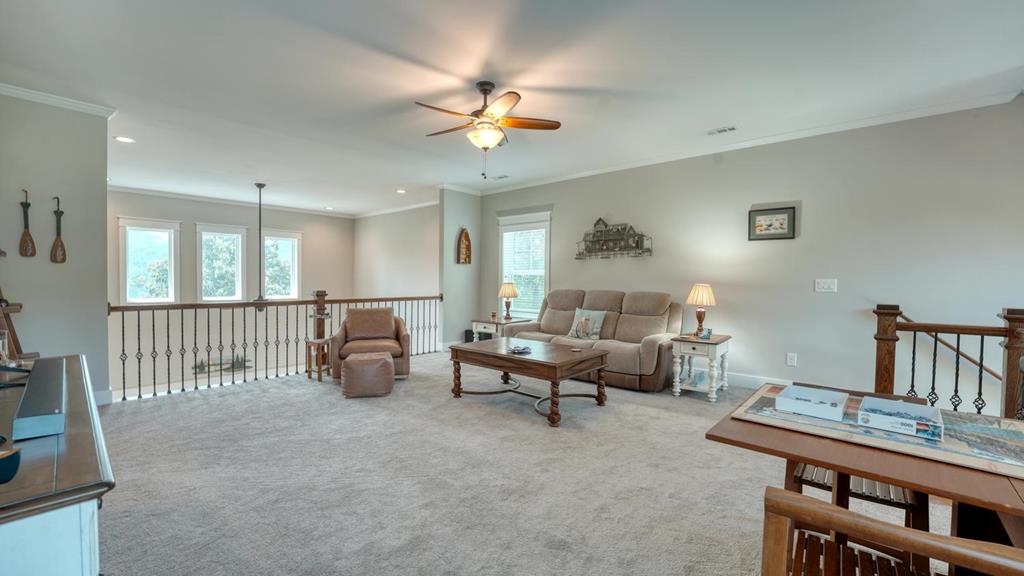 31 Elf School Road Hayesville, NC 28904 - Photo 40 of 59 a living room with furniture and a table