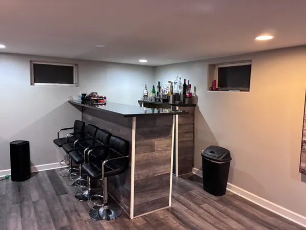 a view of a workspace with furniture