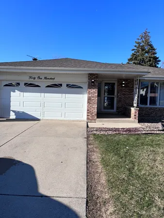 a view of a house with a garage