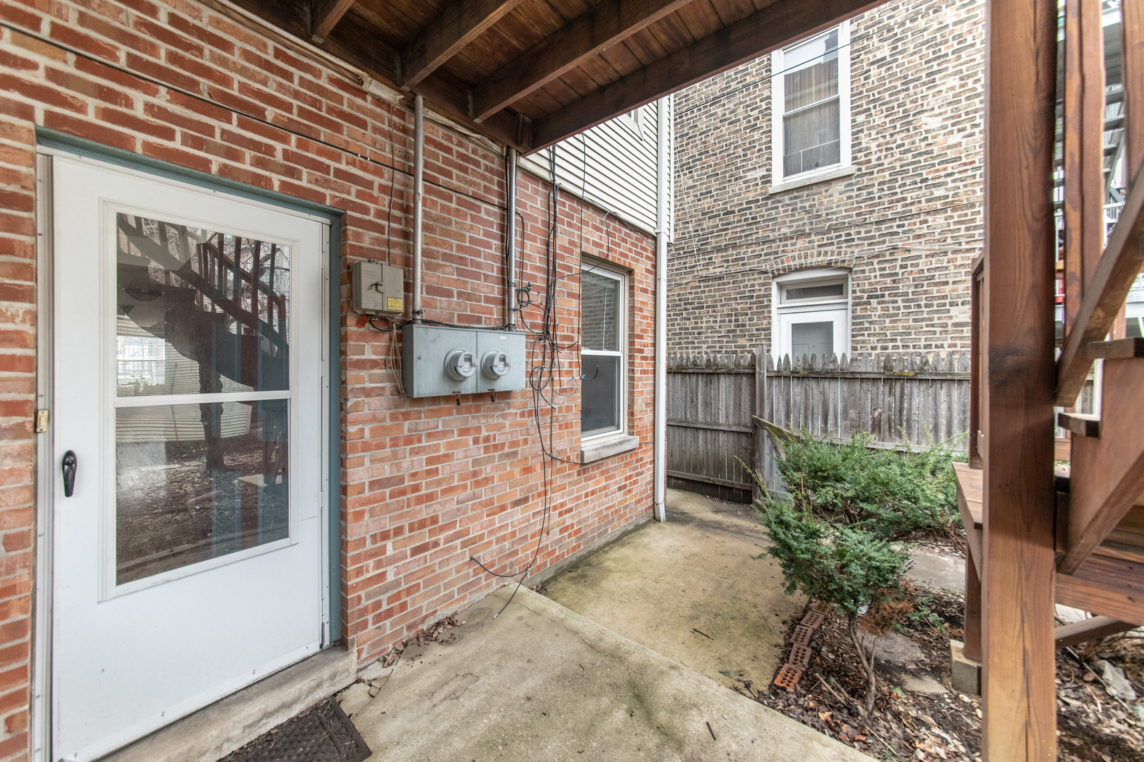 1249 North Cleaver Street, Unit G Chicago, IL 60642 - Photo 14 of 21 a view of a pathway of a house with a yard