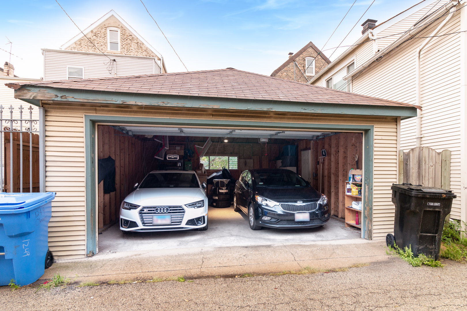 1249 North Cleaver Street, Unit G Chicago, IL 60642 - Photo 20 of 21 a car parked in front of house