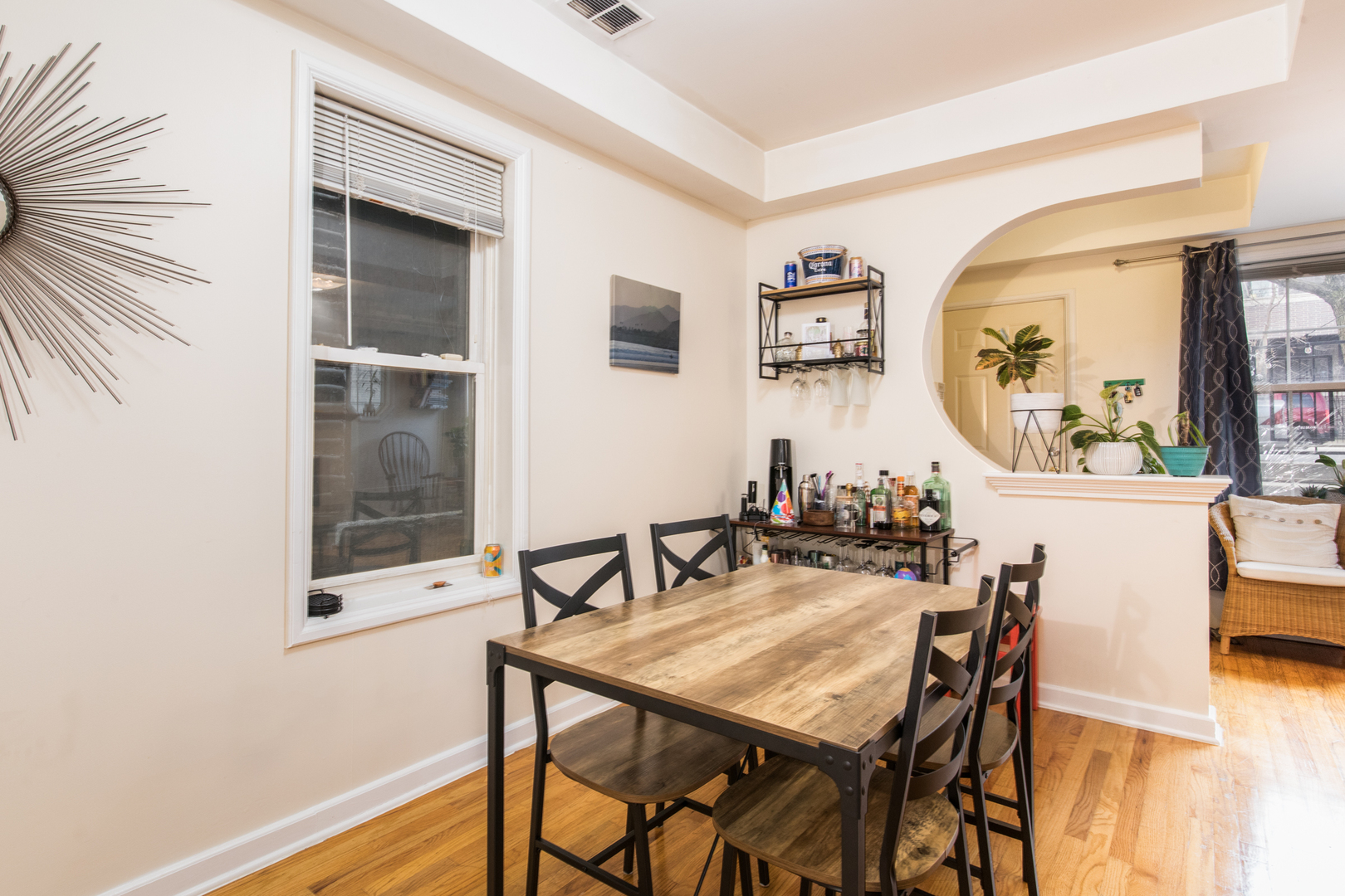 1249 North Cleaver Street, Unit G Chicago, IL 60642 - Photo 7 of 21 a view of a dining room with furniture and wooden floor