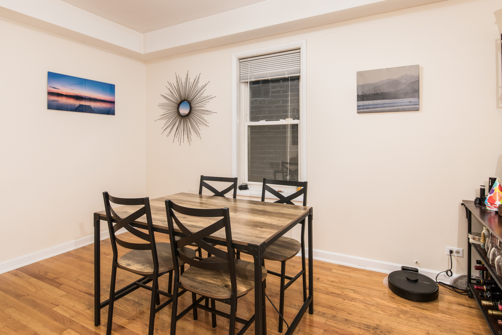 1249 North Cleaver Street, Unit G Chicago, IL 60642 - Photo 8 of 21 a view of a livingroom with furniture and a dining table with wooden floor