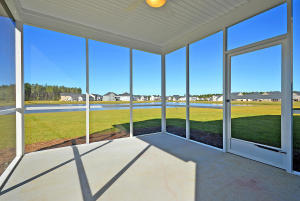 131 Radtko Road Summerville, SC 29486 - Photo 14 of 26 Franklin screened in porch on lot 12