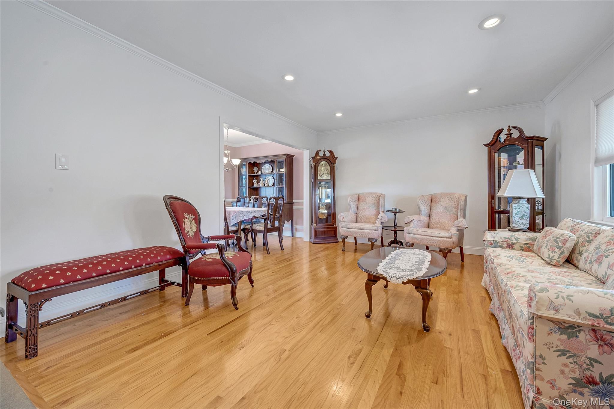 15 Andrew Road Eastchester, NY 10709 - Photo 11 of 22 a living room with furniture and a wooden floor