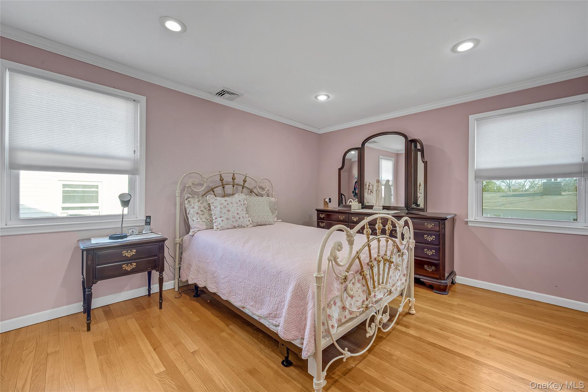 15 Andrew Road Eastchester, NY 10709 - Photo 15 of 22 a bed sitting in a bedroom next to a window