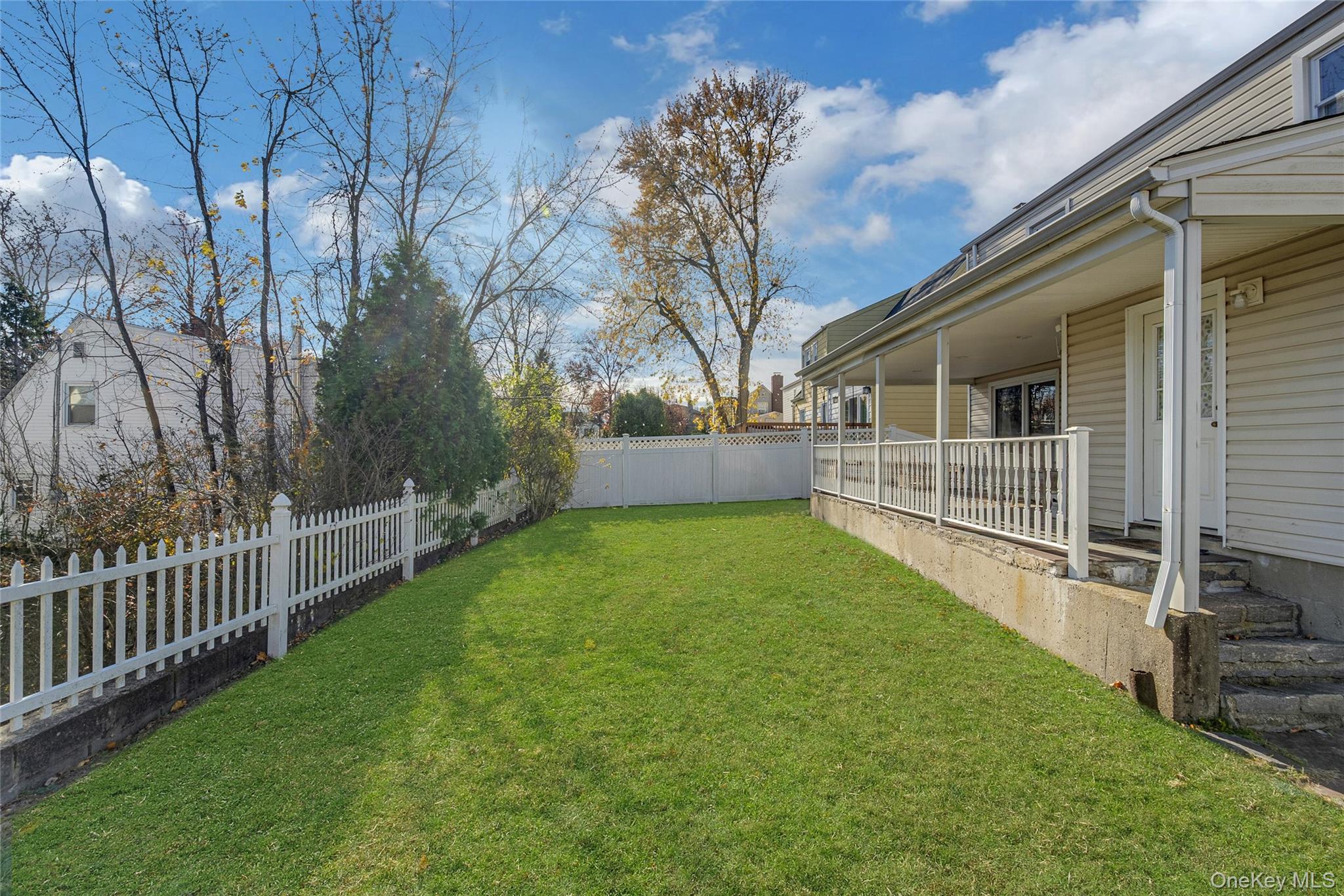 15 Andrew Road Eastchester, NY 10709 - Photo 20 of 22 a view of backyard with green space