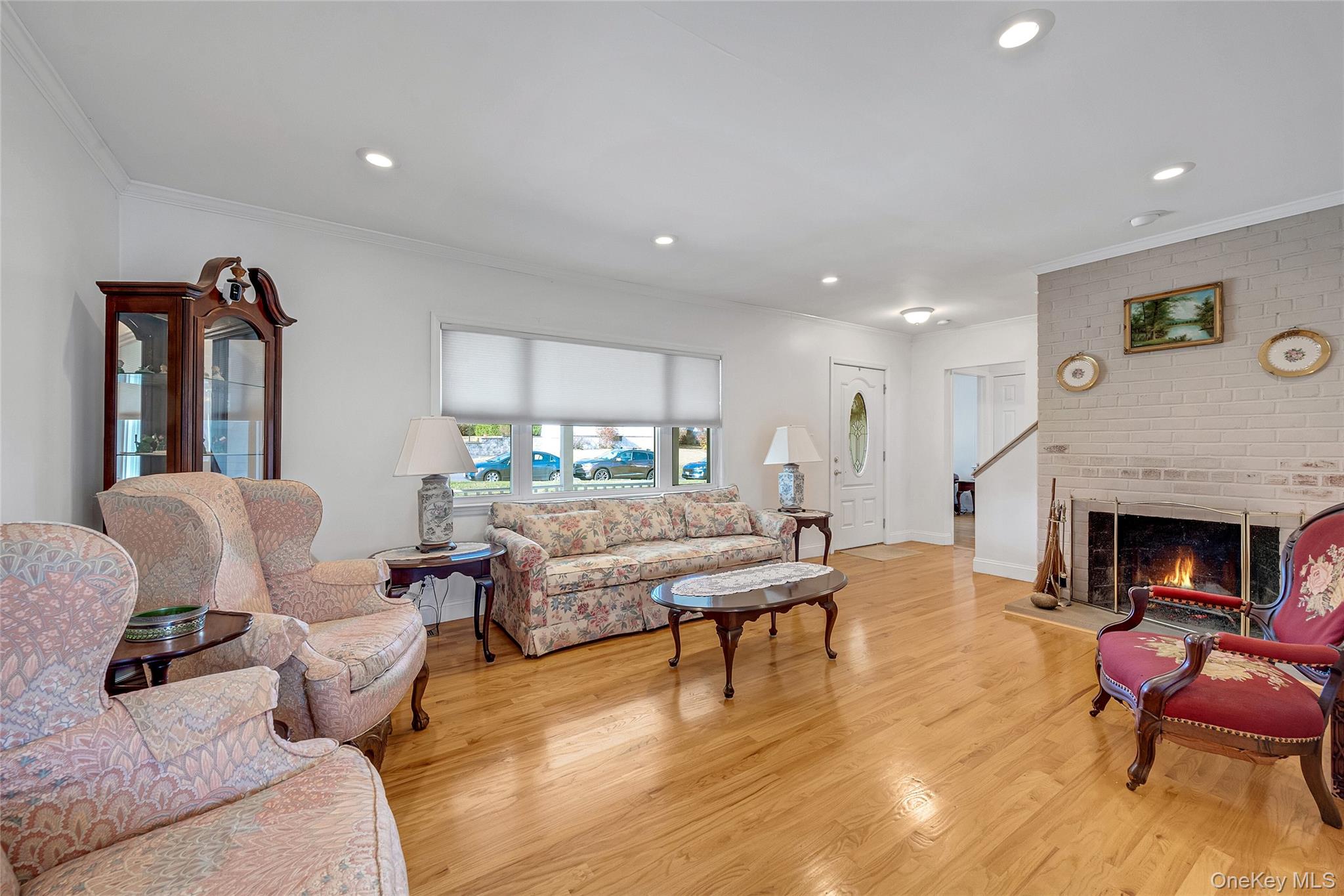 15 Andrew Road Eastchester, NY 10709 - Photo 10 of 22 a living room with furniture and a fireplace