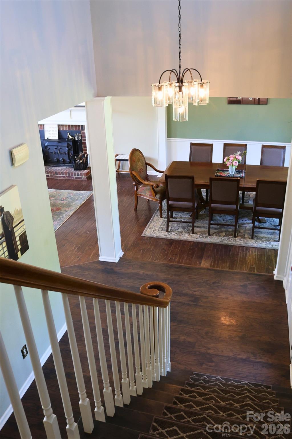 2325 Perry Road Denver, NC 28037 - Photo 15 of 28 a view of a dining room with furniture and wooden floor