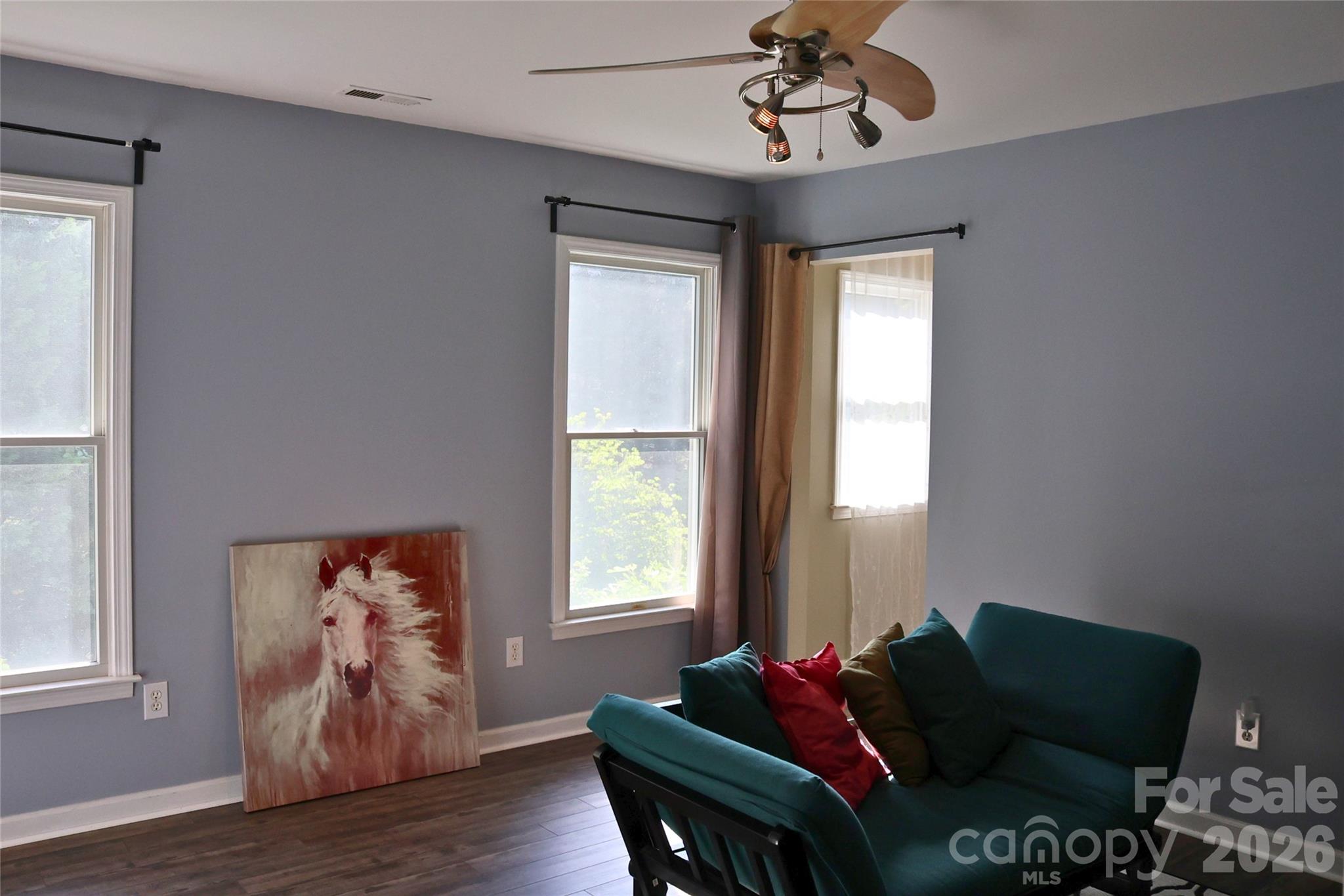 2325 Perry Road Denver, NC 28037 - Photo 19 of 28 a living room with furniture and wooden floor