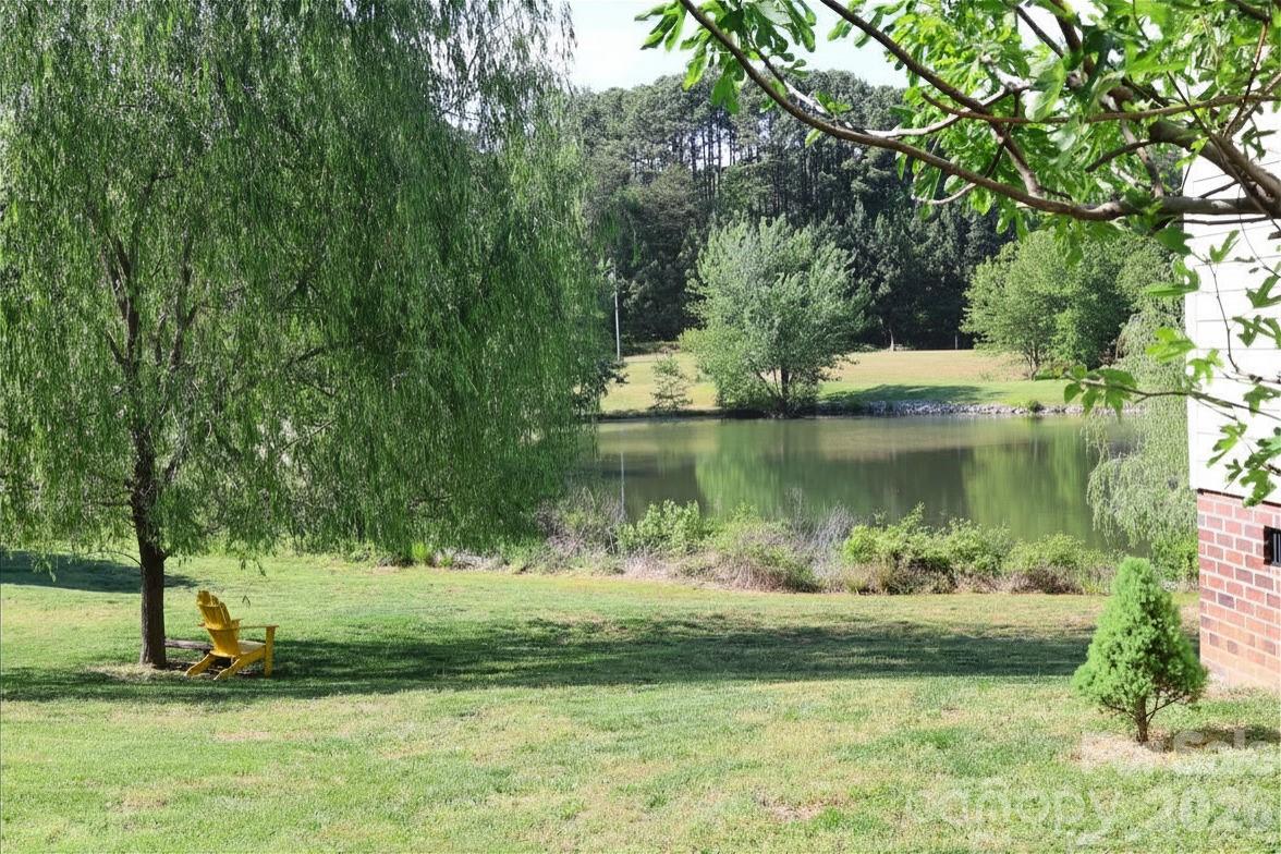 2325 Perry Road Denver, NC 28037 - Photo 27 of 28 a view of a lake in a garden