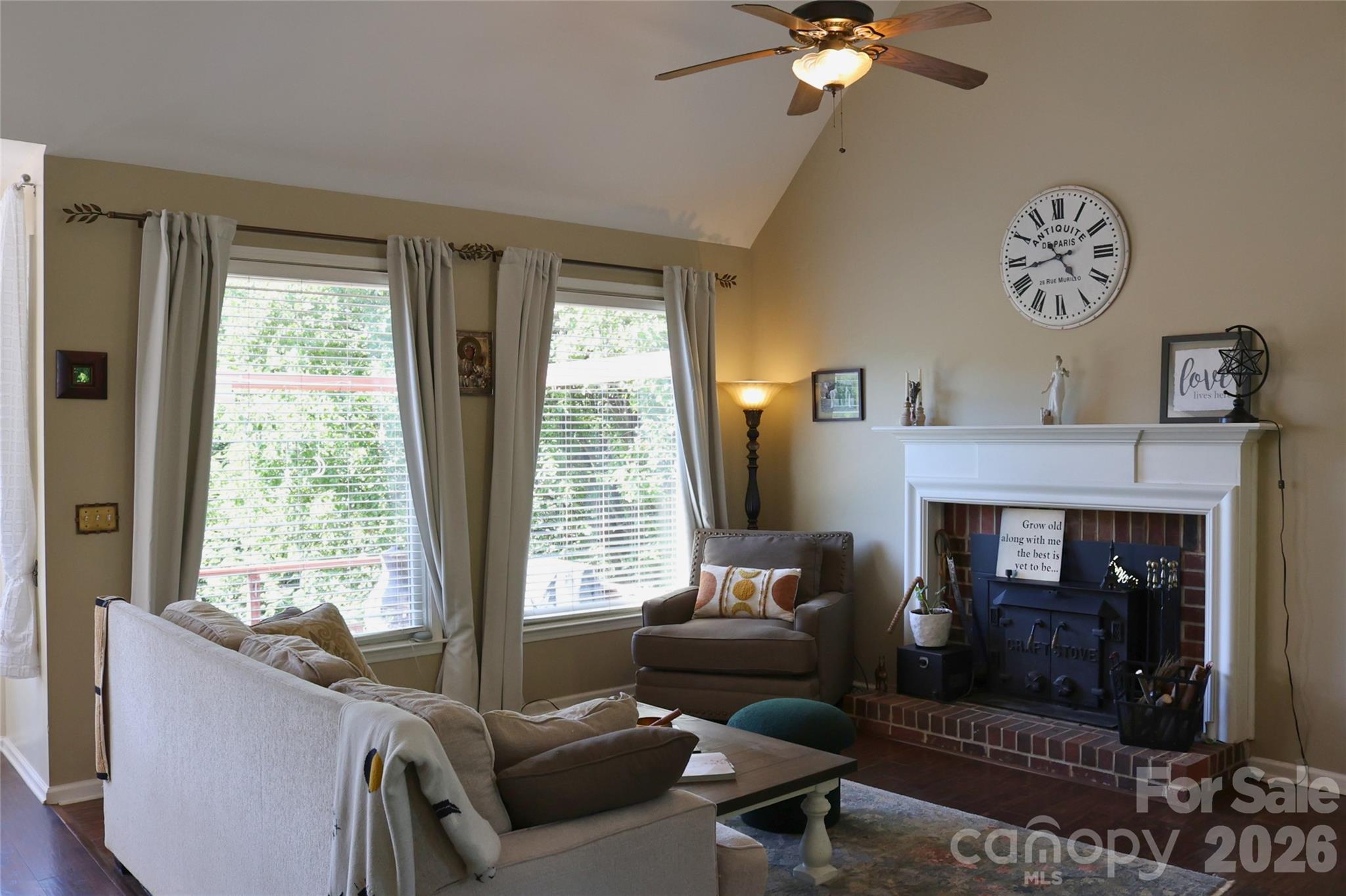 2325 Perry Road Denver, NC 28037 - Photo 3 of 28 a living room with furniture and a fireplace