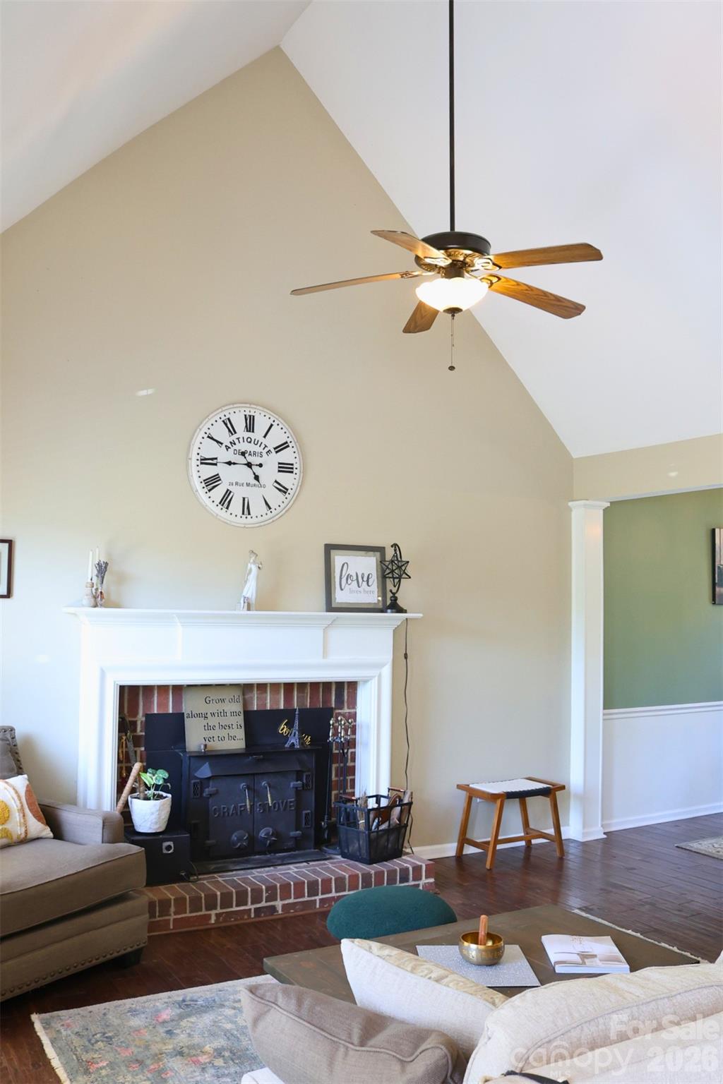 2325 Perry Road Denver, NC 28037 - Photo 4 of 28 a living room with furniture and a fireplace