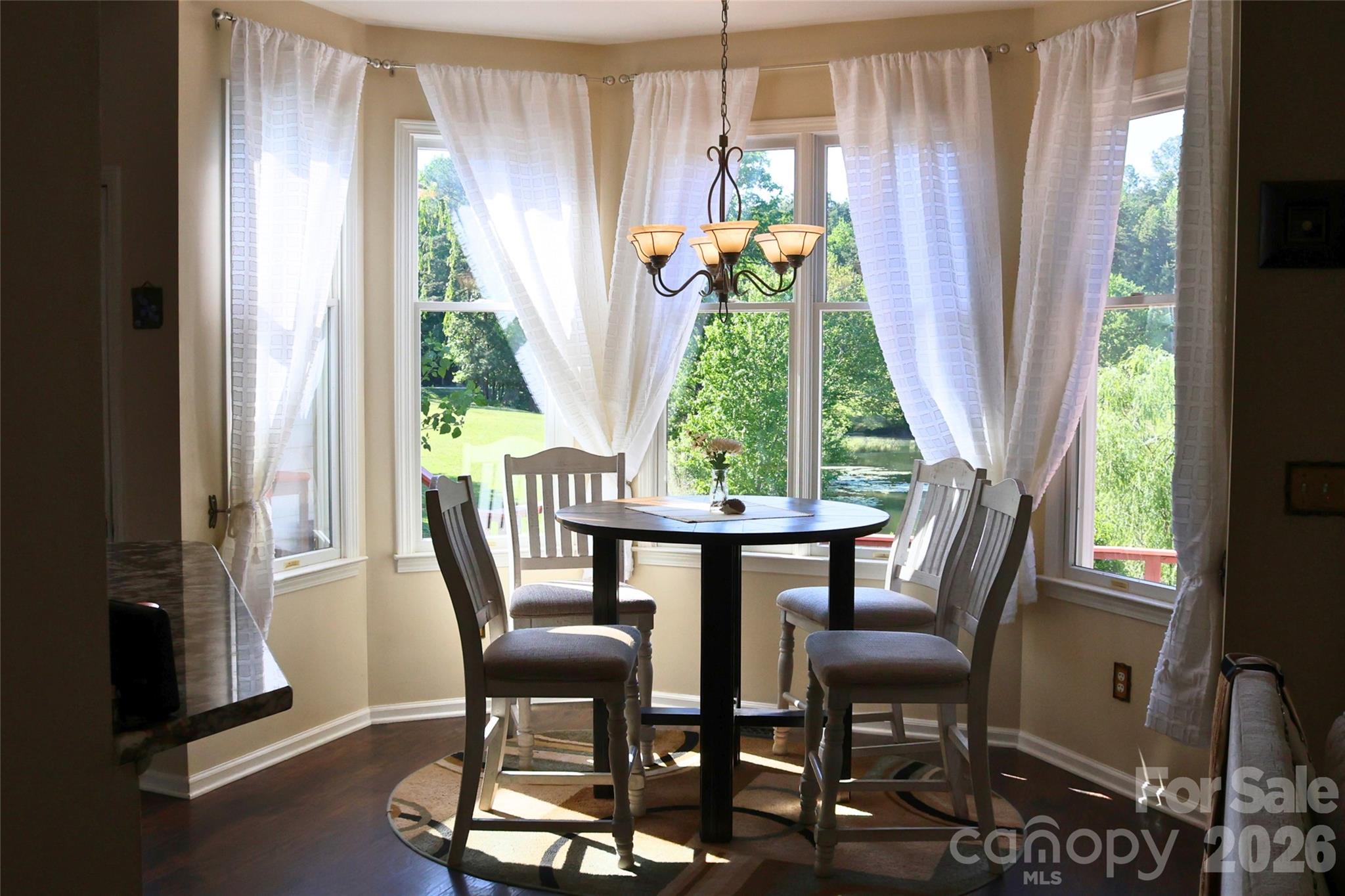 2325 Perry Road Denver, NC 28037 - Photo 7 of 28 a view of a dining room with furniture and a window