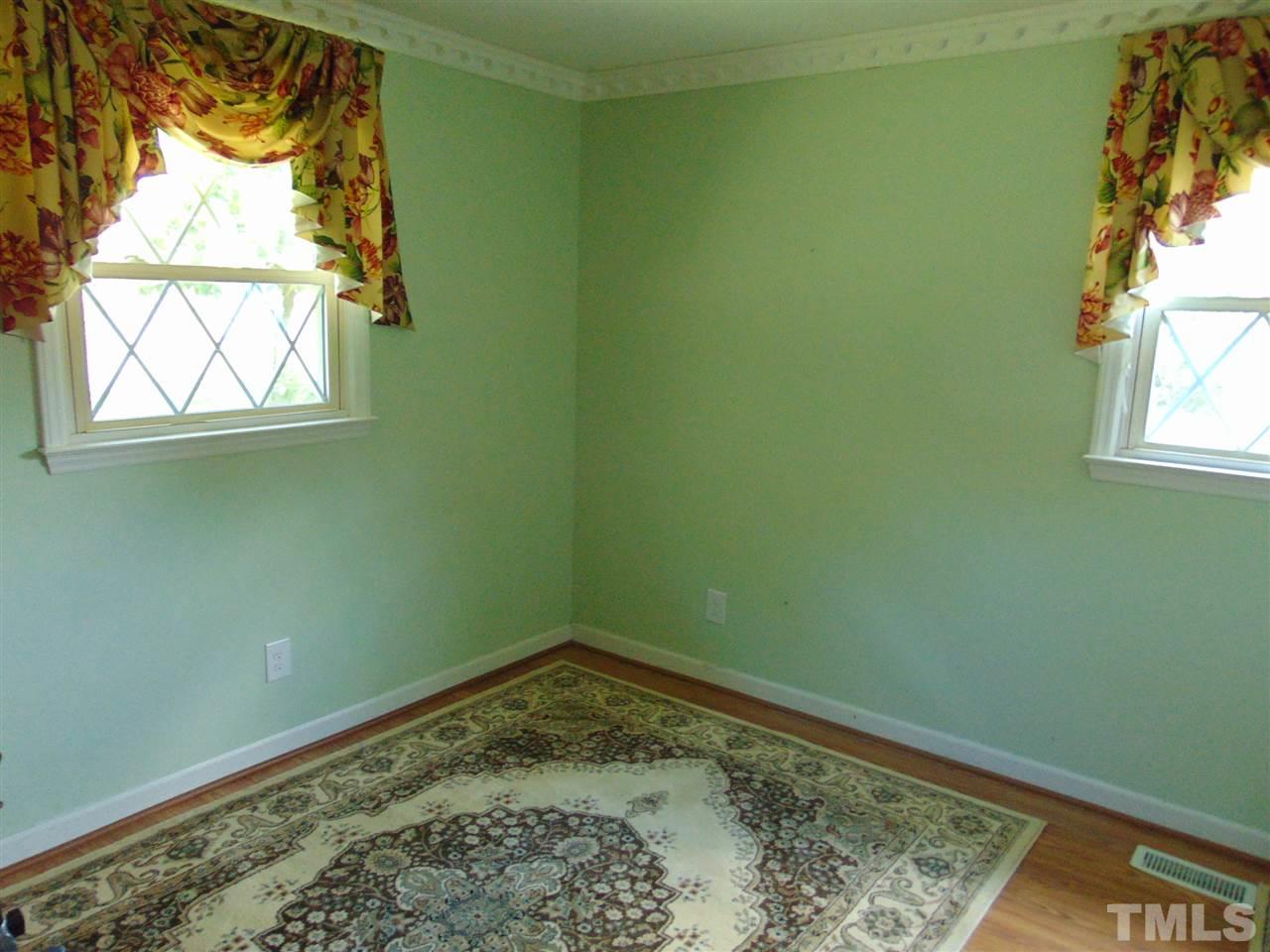 2068 Sanders Road Stem, NC 27581 - Photo 16 of 21 a room with a window