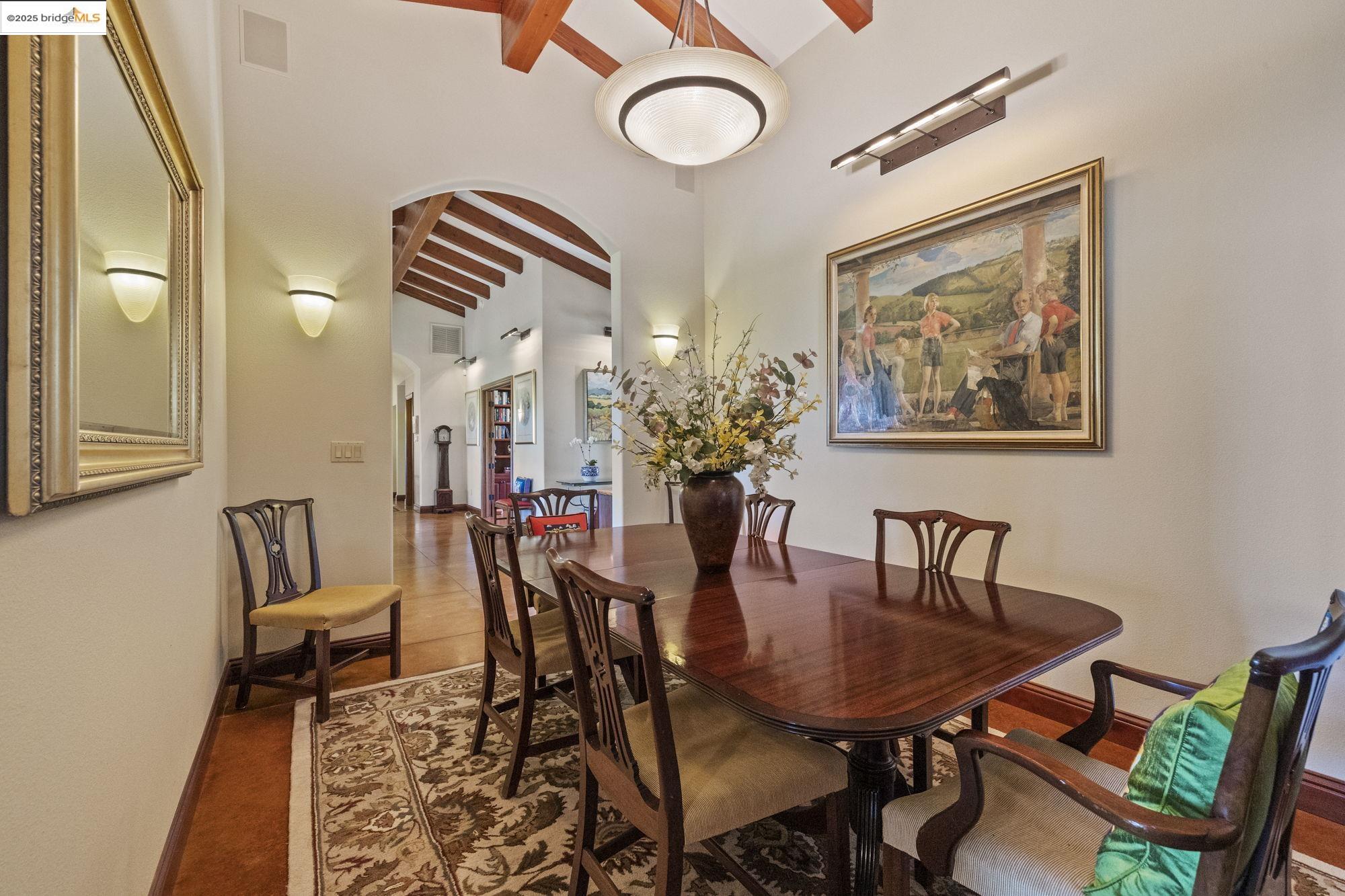 10270 Slate Rim Road Sonora, CA 95370 - Photo 31 of 55 a view of a dining room with furniture and a chandelier