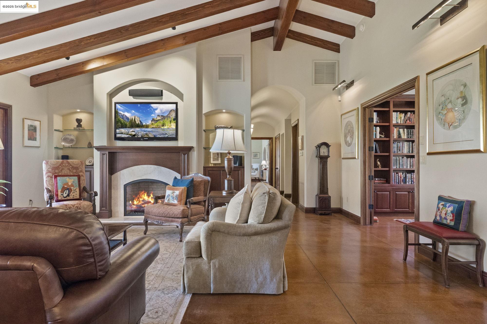 10270 Slate Rim Road Sonora, CA 95370 - Photo 10 of 55 a living room with furniture and a fireplace