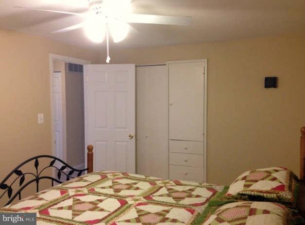1011 Bayner Road Baltimore, MD 21221 - Photo 11 of 30 a bedroom with a bed and a bathroom