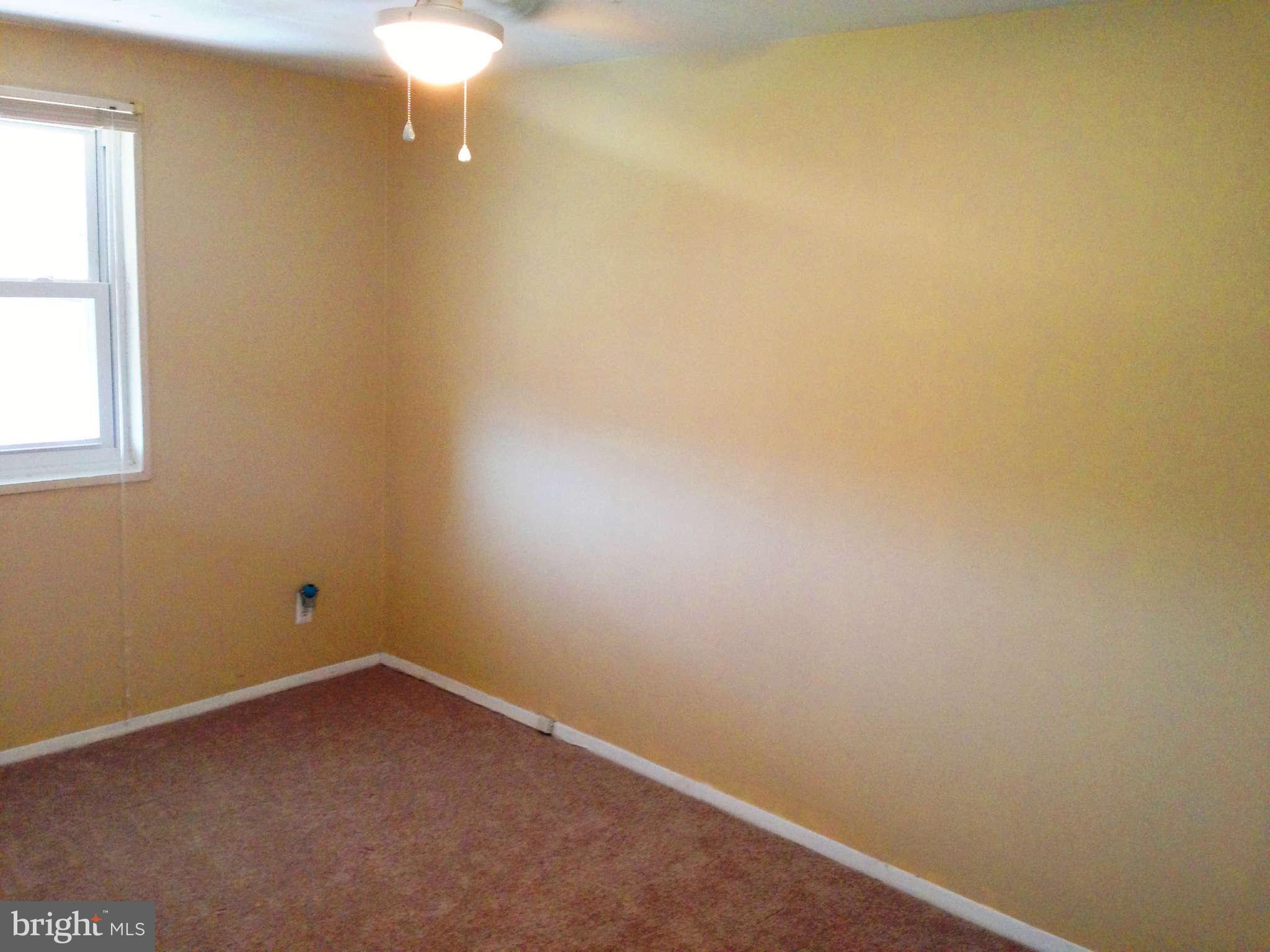 1011 Bayner Road Baltimore, MD 21221 - Photo 15 of 30 an empty room with a empty space and a window
